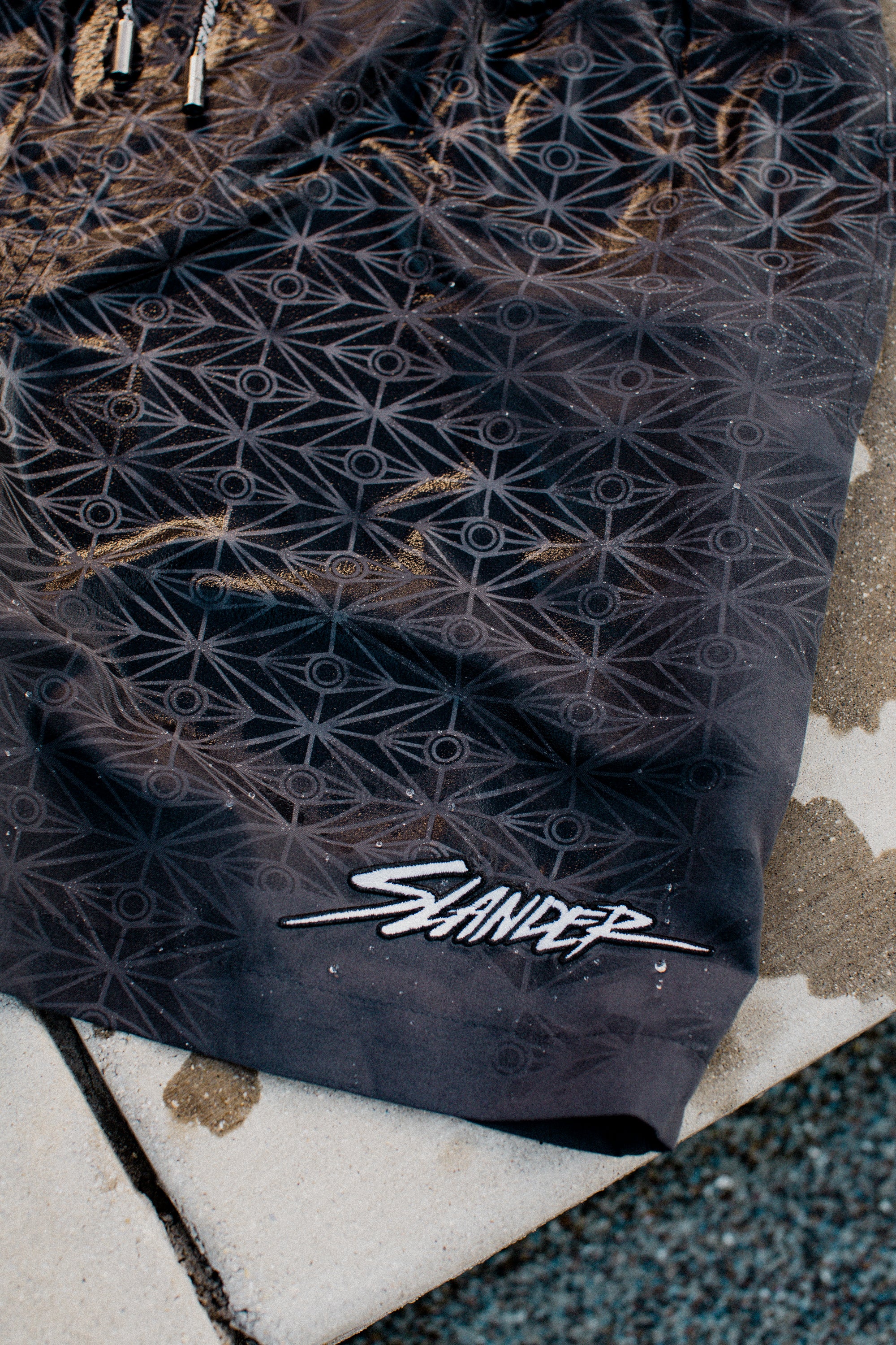 WATER REACTIVE SWIM SHORTS - Slander Merchandise